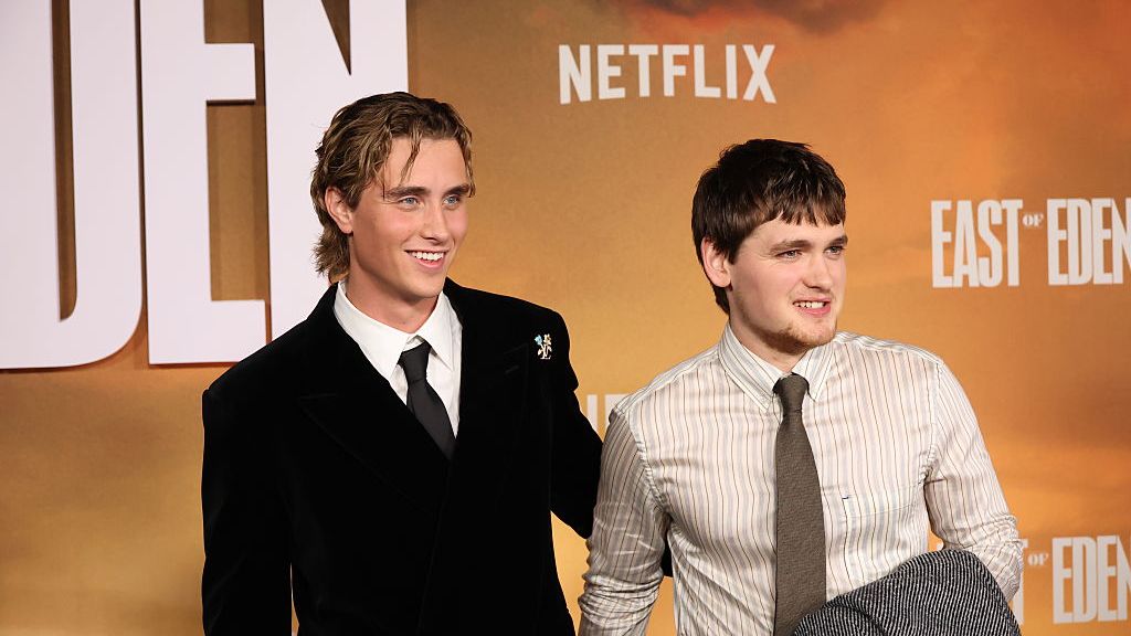 Joseph Zada and Joe Anders pose next to each other at Netflix's 