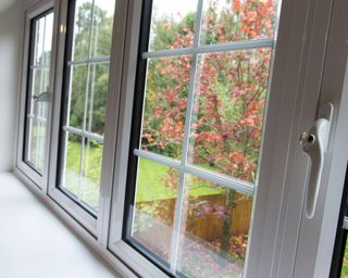 Locked double glazed uPVC windows in a historic home