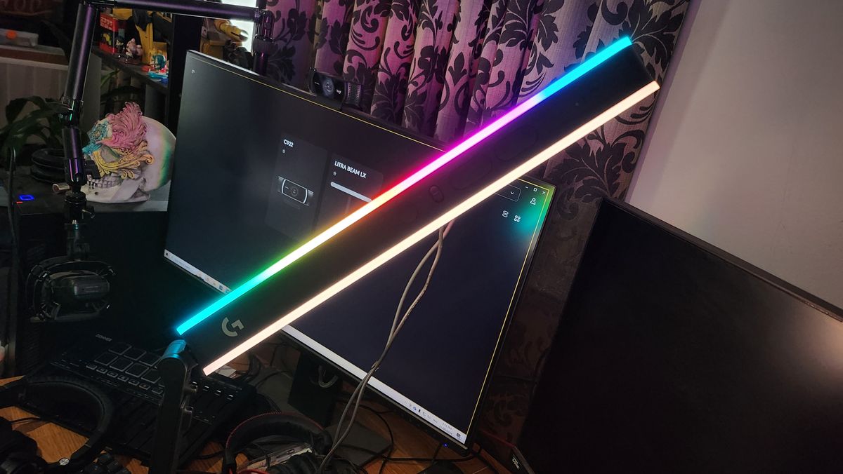 The Logitech Litra Beam LX key light set-up on a desk.