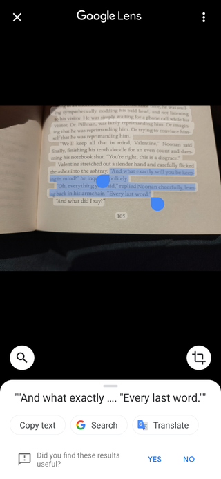 Selecting text from a picture of a book page with Google Lens.