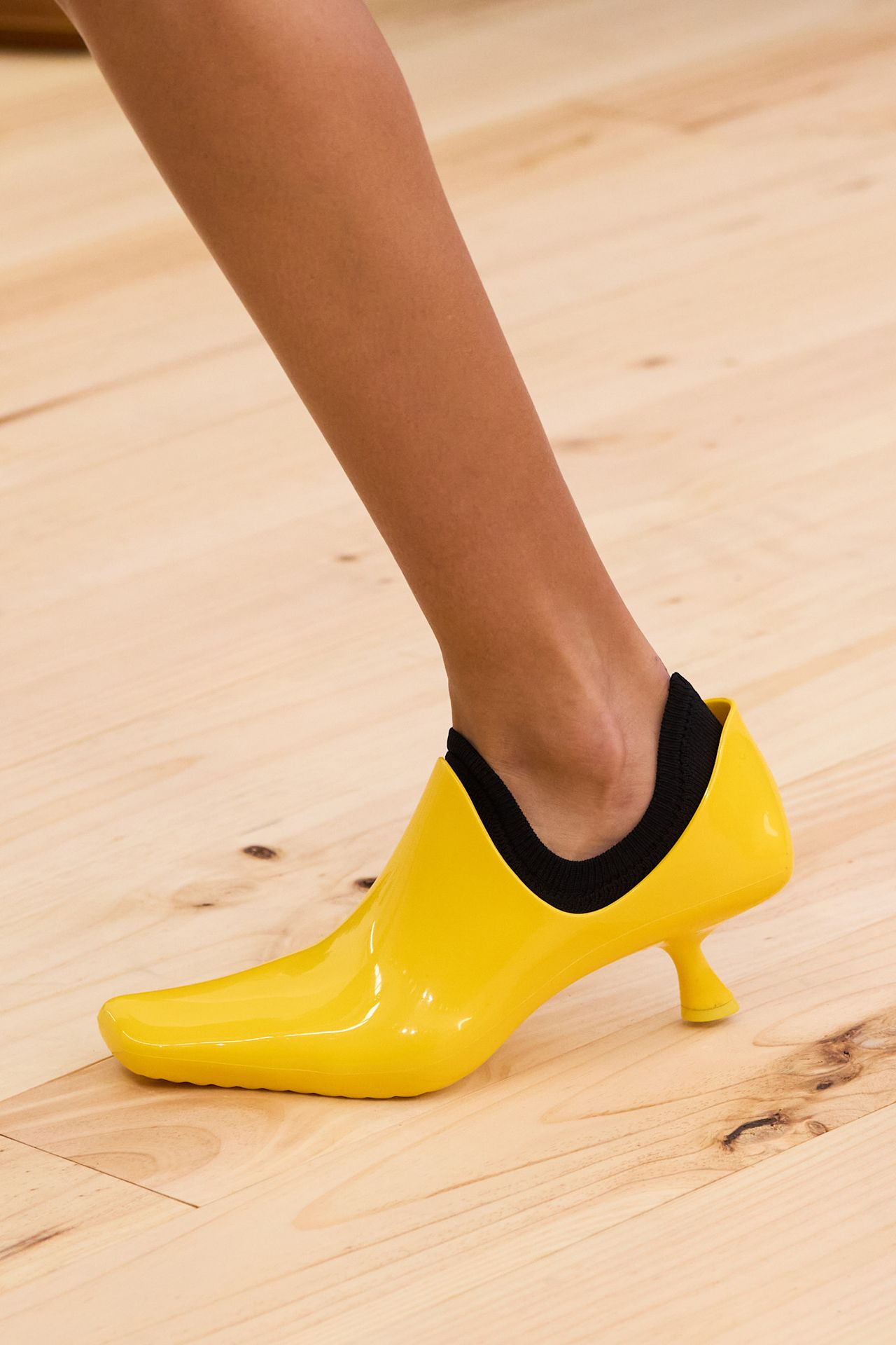 shiny plastic kitten heels with contrast socks on the Loewe Spring 2026 runway