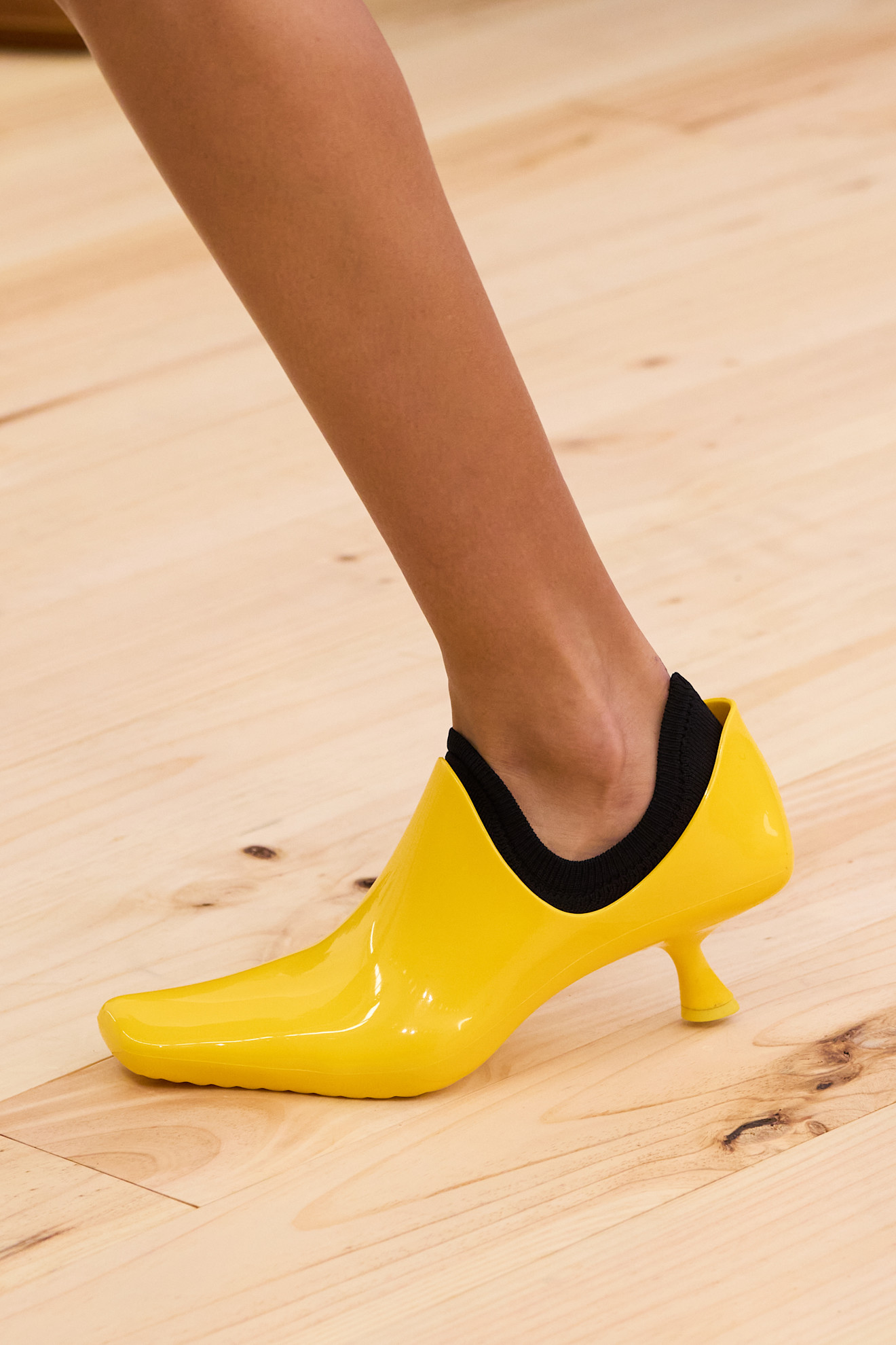 shiny plastic kitten heels with contrast socks on the Loewe Spring 2026 runway