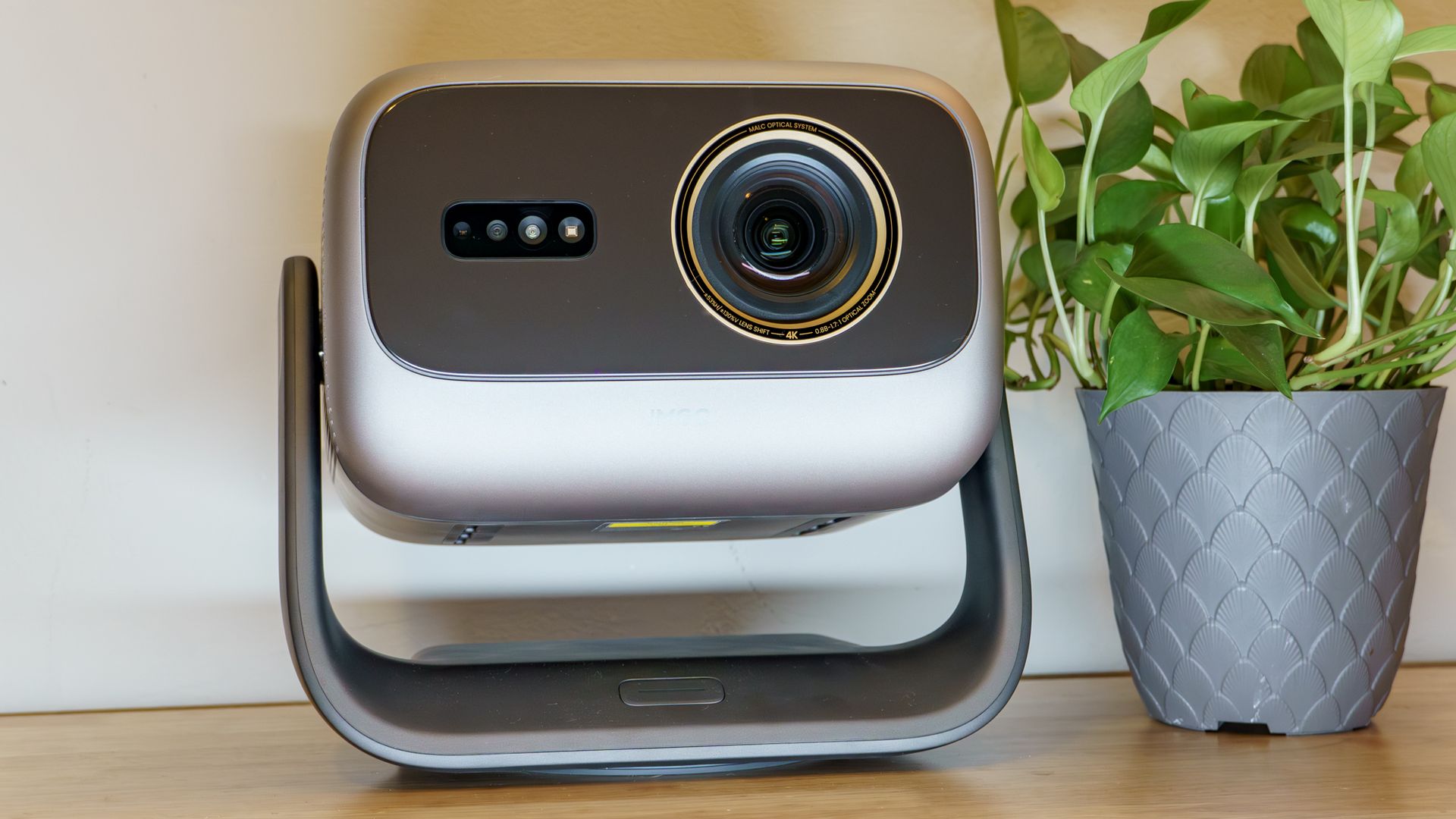 A JMGO N3 Ultimate projector on a desk