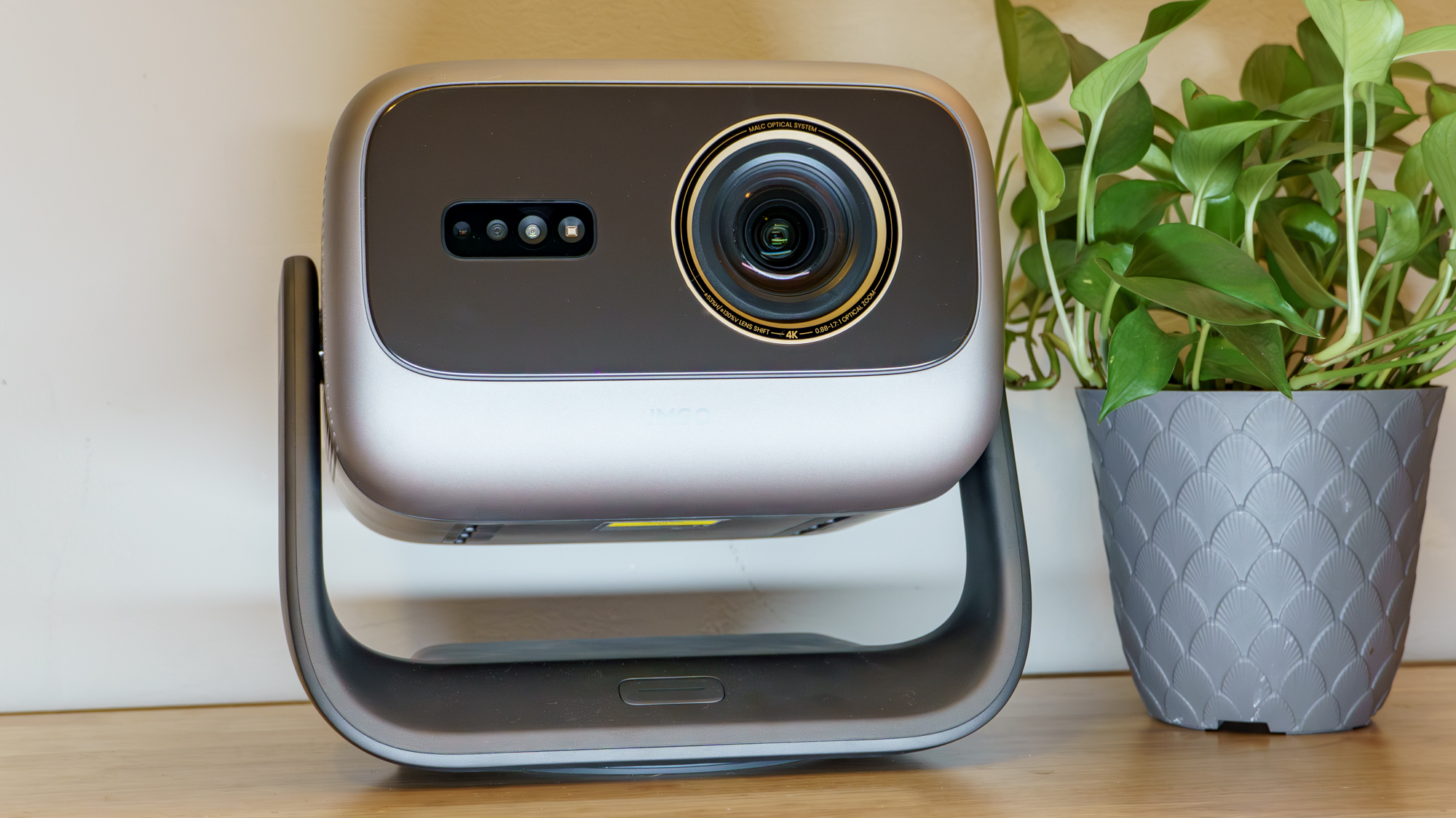 A JMGO N3 Ultimate projector on a desk