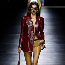 Model walks on the Gucci Ancora SS24 runway show.