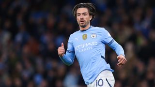 Jack Grealish of Manchester City wearing a blue kit while playing during the Emirates FA Cup