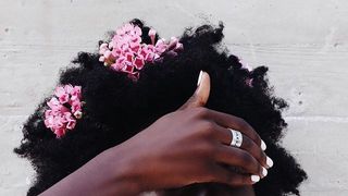 Hair, Pink, Hairstyle, Beauty, Lip, Hair accessory, Black hair, Headpiece, Afro, Human,