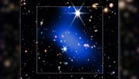 A bright blue streak of light is seen covering a series of bright stars in this dark deep space image. A white box surrounds the blue shape