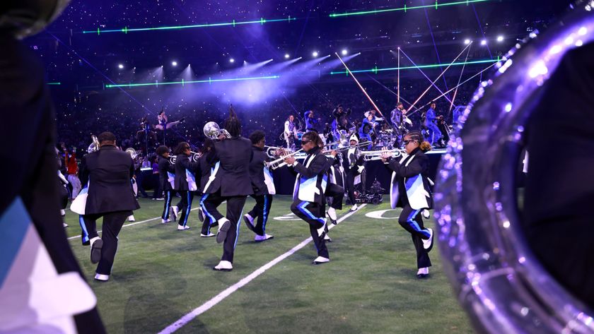 Performers play instruments on the pitch during the Super Bowl halftime show 2024