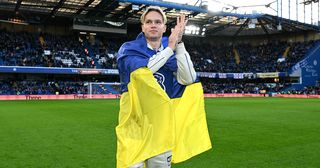 Mykhaylo Mudryk applauds while being introduced to the fans on the pitch at half time during the Premier League match between Chelsea FC and Crystal Palace at Stamford Bridge on January 15, 2023 in London, England.