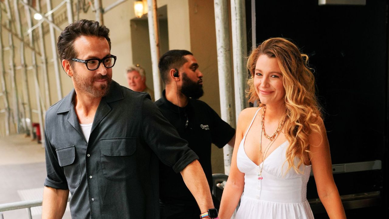 Blake Lively and Ryan Reynolds walk down the street in New York City