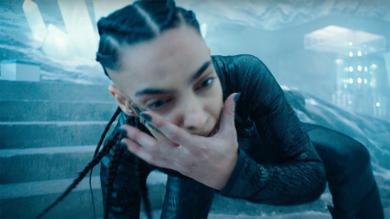 The Engineer clutching her face in 2025's Superman movie