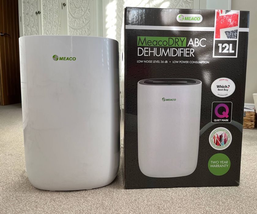 white Meaco dehumidifier next to box