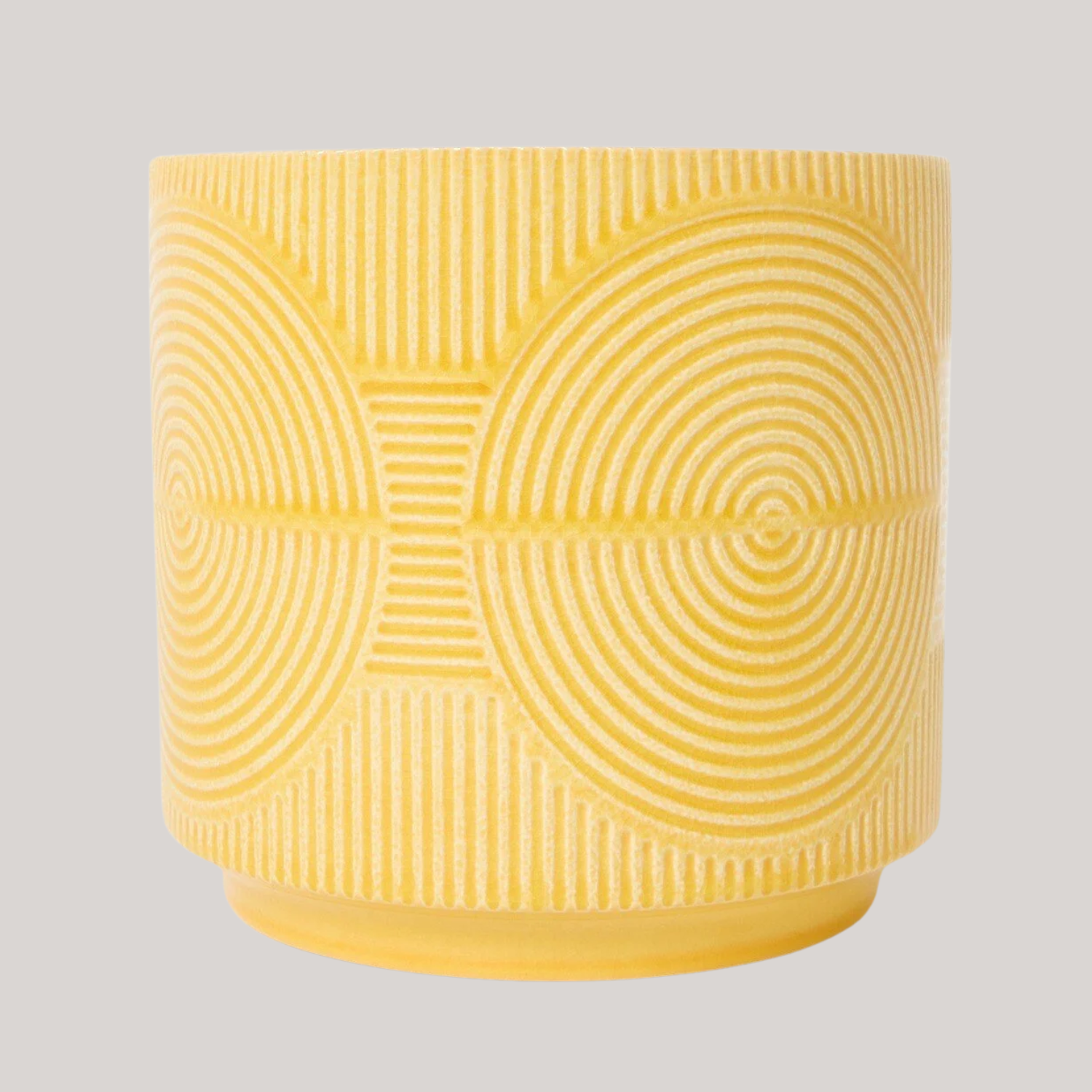 A textured yellow planter