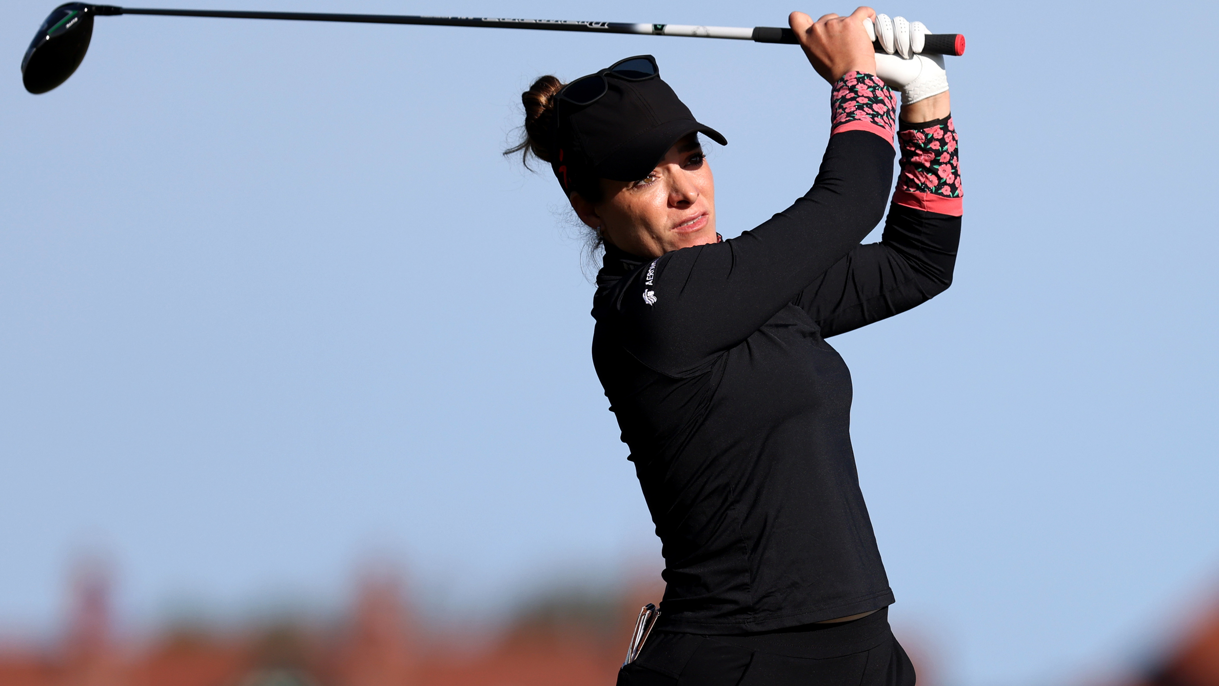 Gaby Lopez holds her finish on a drive