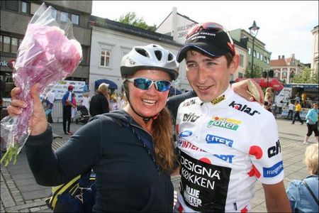 Sergey Firsanov and a fan are all smiles after a successful stage four.