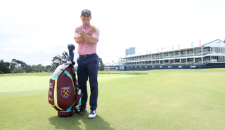 Billy Horschel stands by the West Ham bag whilst displaying an irons logo