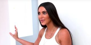 Kim Kardashian telling Scott she's expecting
