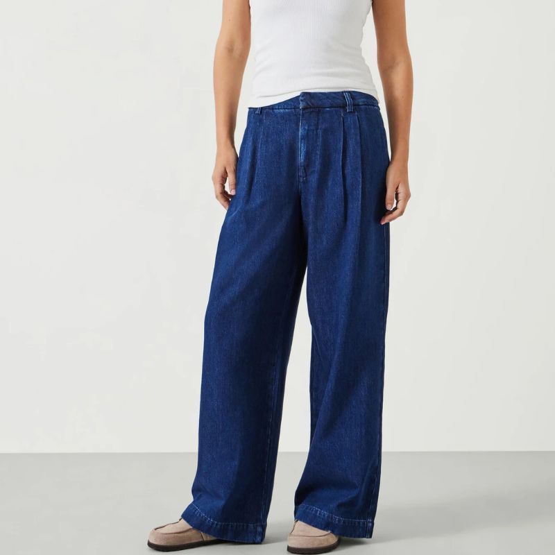 Hush pleated wide leg trousers on model 