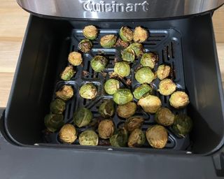 Brussel sprouts after cooking in the Cuisinart basket airfryer