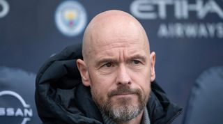 Erik ten Hag looks on during Manchester United's derby defeat to Manchester City in the Premier League in March 2024.