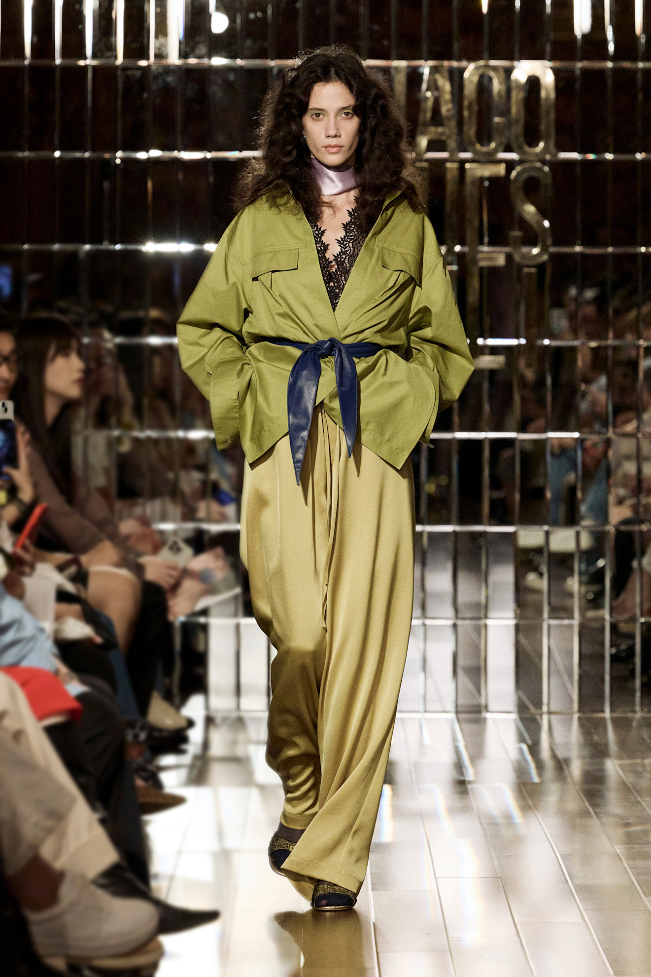 Jacques Wei spring/summer 26 runway model wears green jacket and trousers