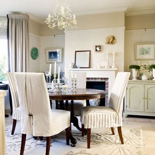 dining room with table and chairs and fireplace