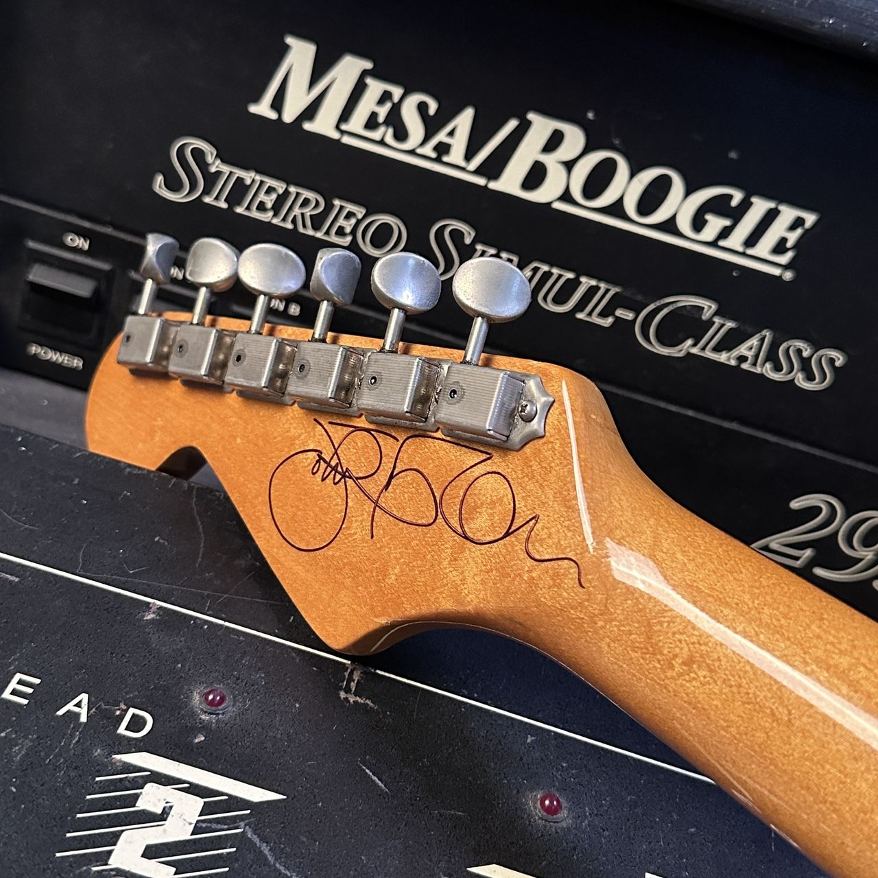 various photos of the Johnny Marr Strat and Mesa Boogie Gardiner Houlgate auction