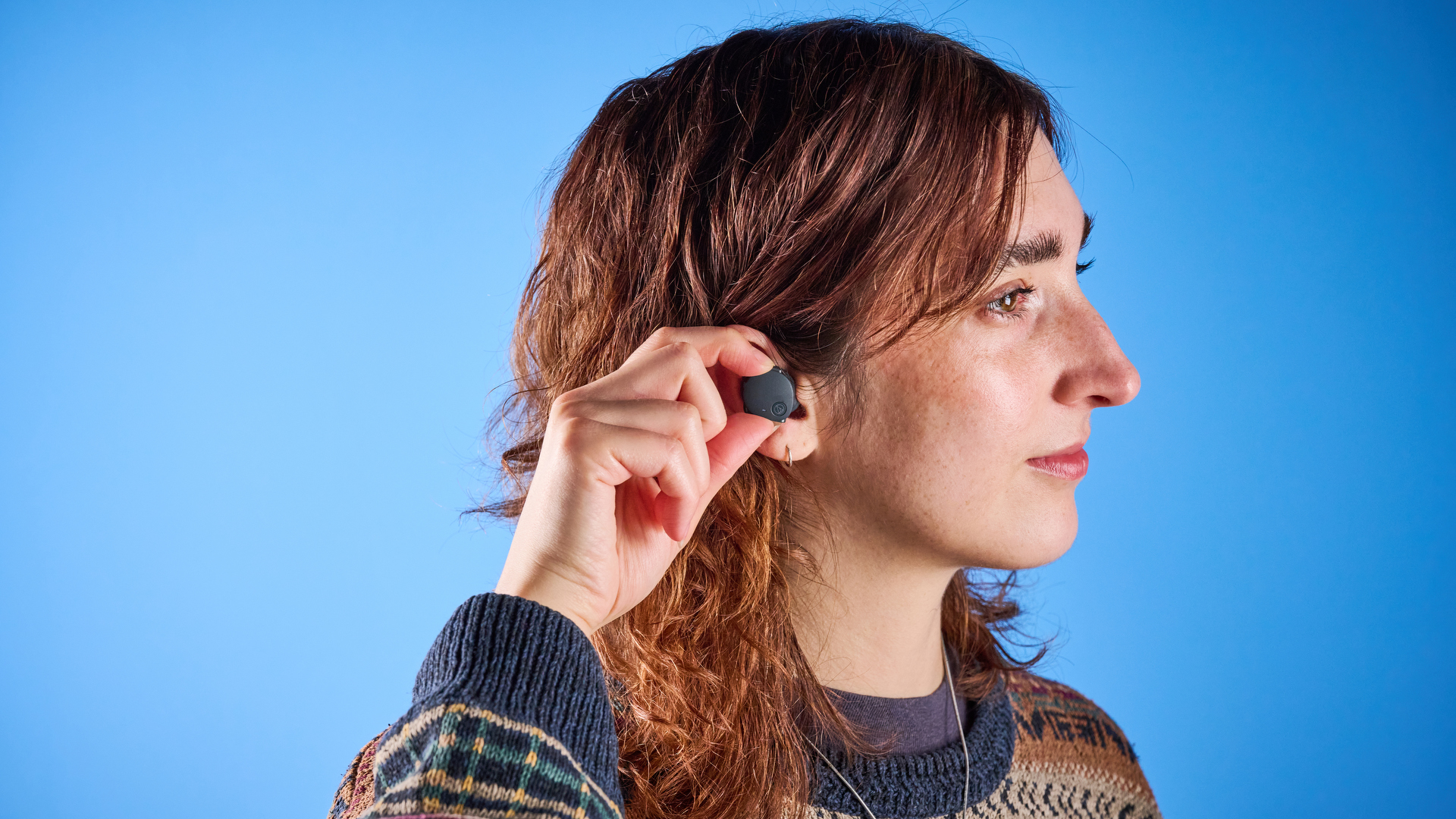 Audio-Technica ATH-CKS50TW2 in black colorway photographed ona blue background