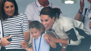 Carole Middleton, Princess Charlotte and Catherine, Princess of Wales attend the presentation following the King's Cup Regatta
