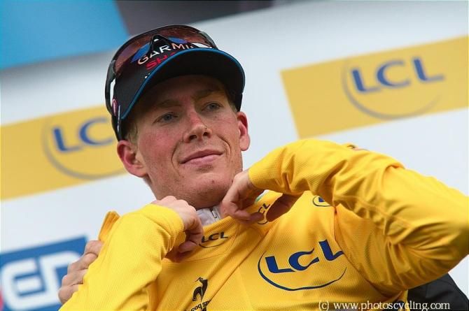 Andrew Talansky (Garmin-Sharp) dons the leader's yellow jersey at Paris-Nice.