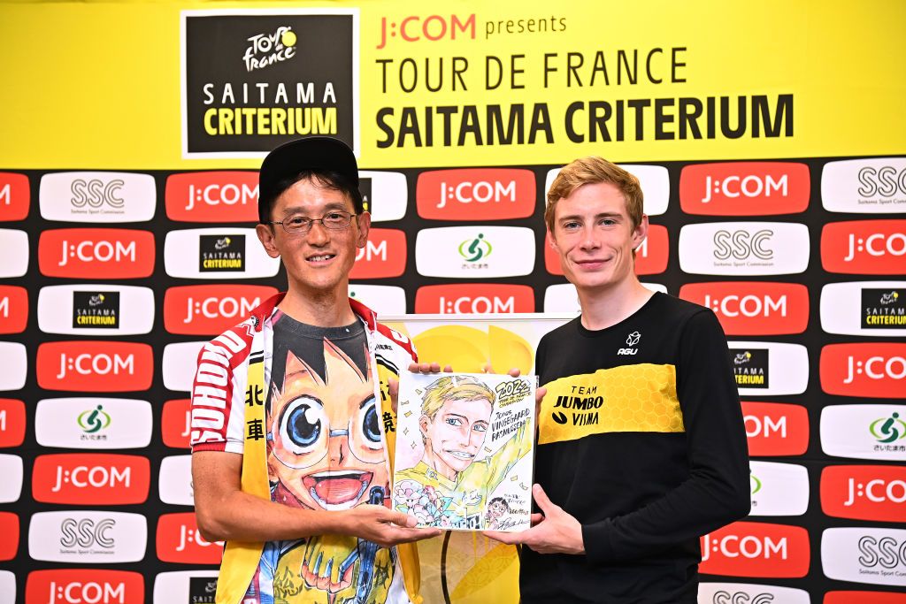 SAITAMA JAPAN NOVEMBER 05 LR Wataru Watanabe of Japan author of sports manga Yowamushi Pedal and Jonas Vingegaard Rasmussen of Denmark and Team Jumbo Visma Yellow Leader Jersey during the 8th Tour de France Saitama Criterium 2022 Media Day SaitamaCriterium on November 05 2022 in Saitama Japan Photo by Kenta HaradaGetty Images