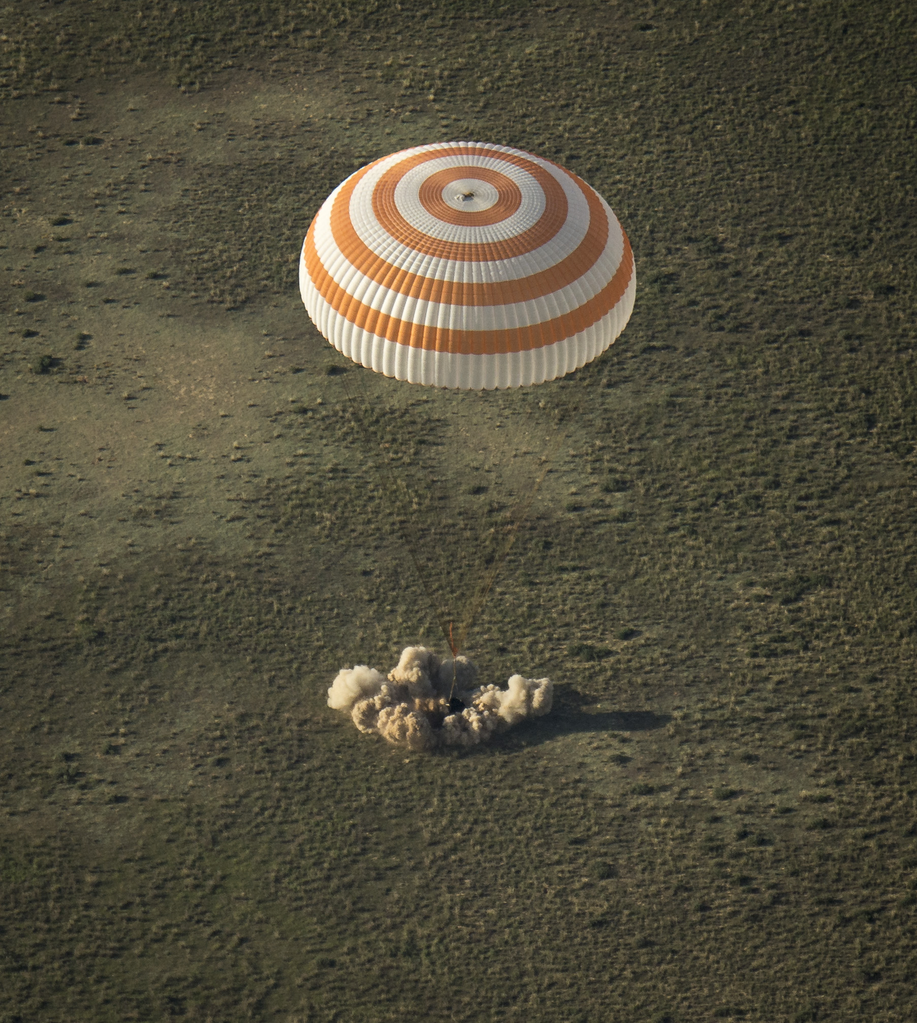 A Soyuz TMA-11M space capsule lands with Expedition 39 Commander Koichi Wakata of the Japan Aerospace Exploration Agency (JAXA), Soyuz Commander Mikhail Tyurin of Roscosmos, and Flight Engineer Rick Mastracchio of NASA near the town of Zhezkazgan, Kazakhs