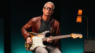Mike McCready plays his signature Fender Stratocaster