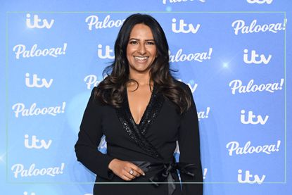 a close up of Ranvir Singh smiling in a black suit at the ITV Palooza party