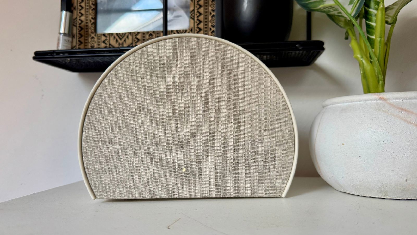 Beige Hatch Sleep Clock on white surface