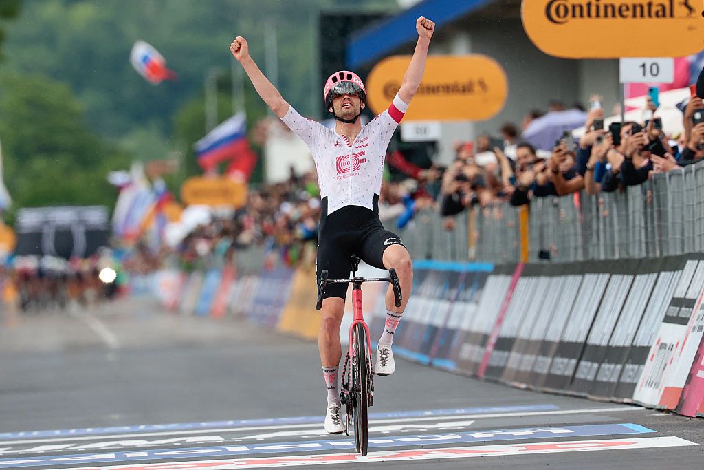 EF Education - EasyPost's Danish rider Kasper Asgreen celebrates after victory as he crosses the finish of the 14th stage of the 108th Giro d'Italia cycling race of 195kms from Treviso in Italy to Nova Gorica in Slovenia on May 24, 2025. (Photo by Luca Bettini / AFP)