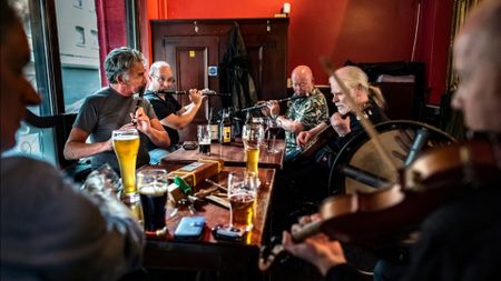 Irish musicians perform in the John Hewitt pub in Belfast. The pub prides itself on its list of Irish beers and traditional music.