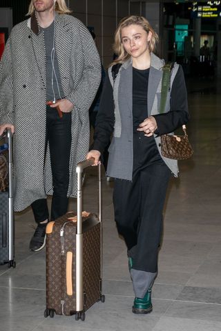 Chloe Moretz carrying a Louis Vuitton bag