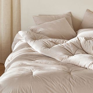 Winter Hotel Micro Fiber Comforter on a bed.