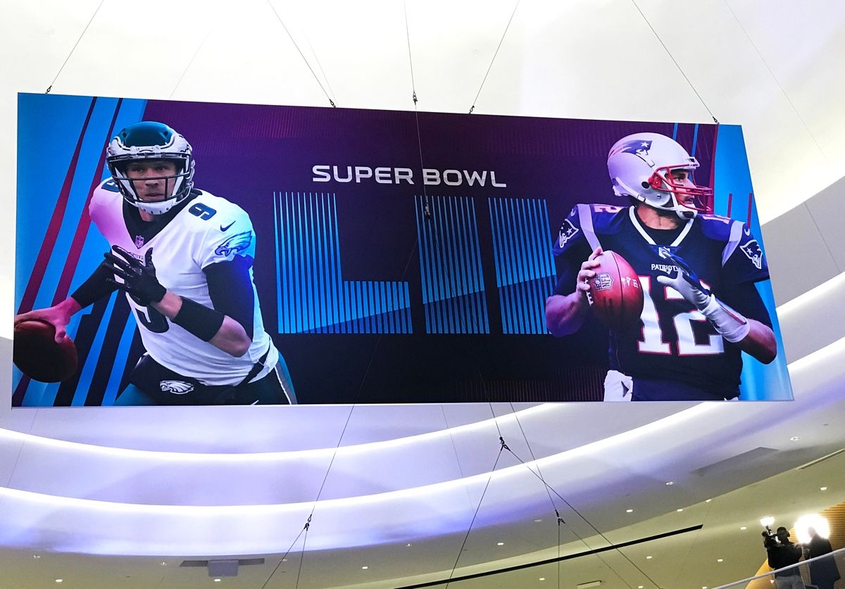 Super Bowl banner featuring Tom Brady and Nick Foles in the Mall. The two quarterbacks go head to head on Sunday in the big game. bold northeaglesfootballmallmall of americaminneapolisminnesotanew england patriotsnflnick folesphiladelphia eaglesquarterbac