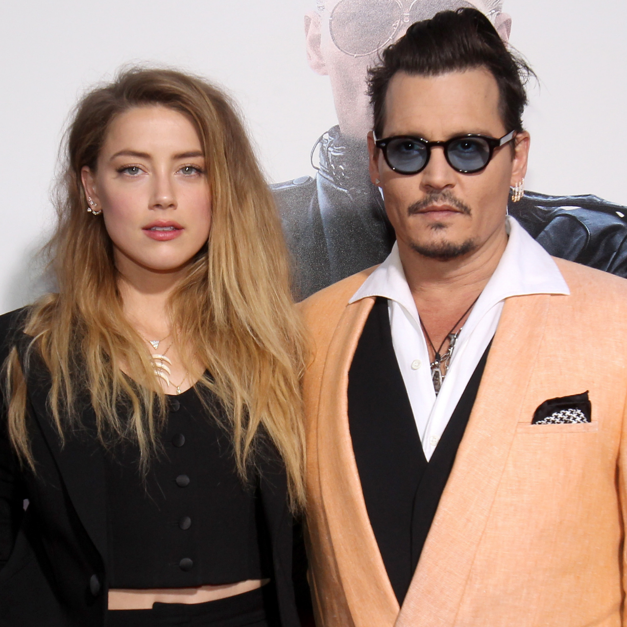 Amber Heard and Johnny Depp attend the Boston premiere of Black Mass