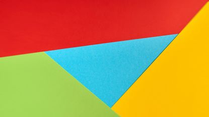 Colors of the Google logo represented by colored paper 