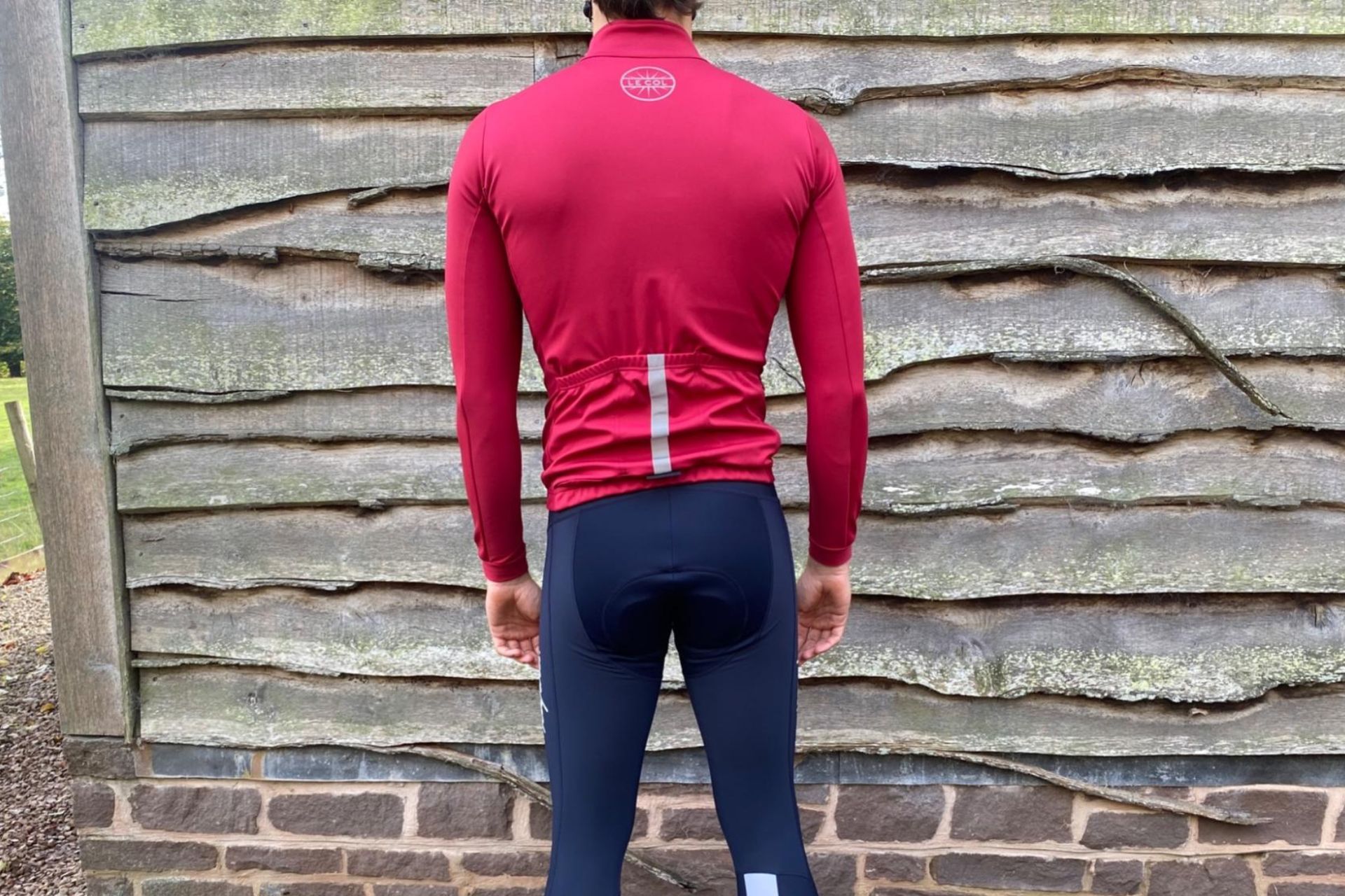 Image shows a rider wearing the Le Col Pro Jacket II.