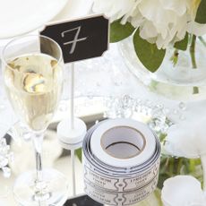 wedding with white flowers and drink glass