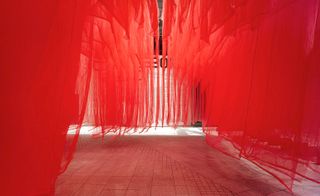 Image showing red mesh creating a covered public space