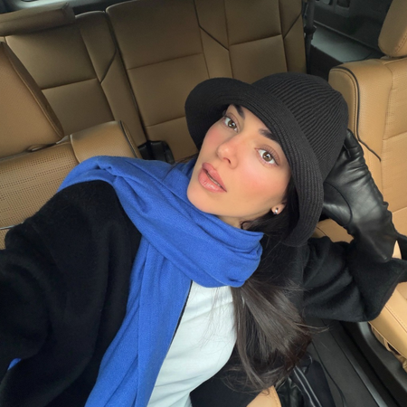 Fashion person Kendall Jenner wears hat trends spring 2026.