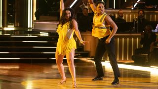 Lauren and Brandon on the dance floor in Week 3 in matching yellow attire.
