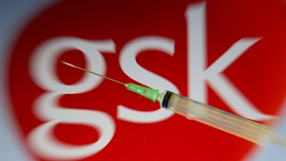 GSK logo and a hypodermic needle