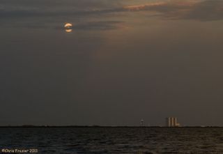 Chris Frazier photographed the Harvest Moon over NASA's Vehicle Assembly Building from Space View Park in Titusville, FL, on Sept. 11, 2011.